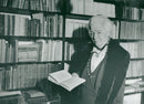 Selma LagerlÃ¶f with a book in her library  - 13 October 1938 - Vintage Photograph