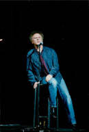 Art Garfunkel appears in front of the French audience at the Palais des Congres. - Vintage Photograph