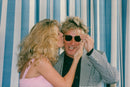 Singer Rod Stewart together with his wife Rachel Hunter at the MIP-TV festival in Cannes. - Vintage Photograph