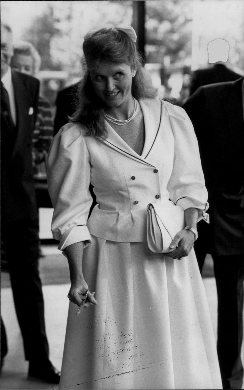 Sarah Ferguson has just cut the band and open an exhibition of Prince Andrews photos in the concert hall Royal Albert Hall - Vintage Photograph