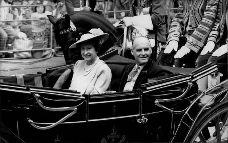 Queen Elizabeth II of England and Ronald Ferguson drive a carriage back to the palace after the wedding between Sarah Ferguson and Prince Andrew - Vintage Photograph