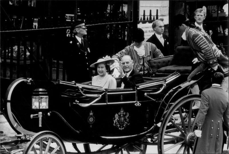 Queen Elizabeth II of England and Ronald Ferguson drive a carriage back to the palace after the wedding between Sarah Ferguson and Prince Andrew - Vintage Photograph