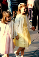 Beatrice and Eugenie together with their parents Prince Andrew and Fergie on their way to a musical. - Vintage Photograph