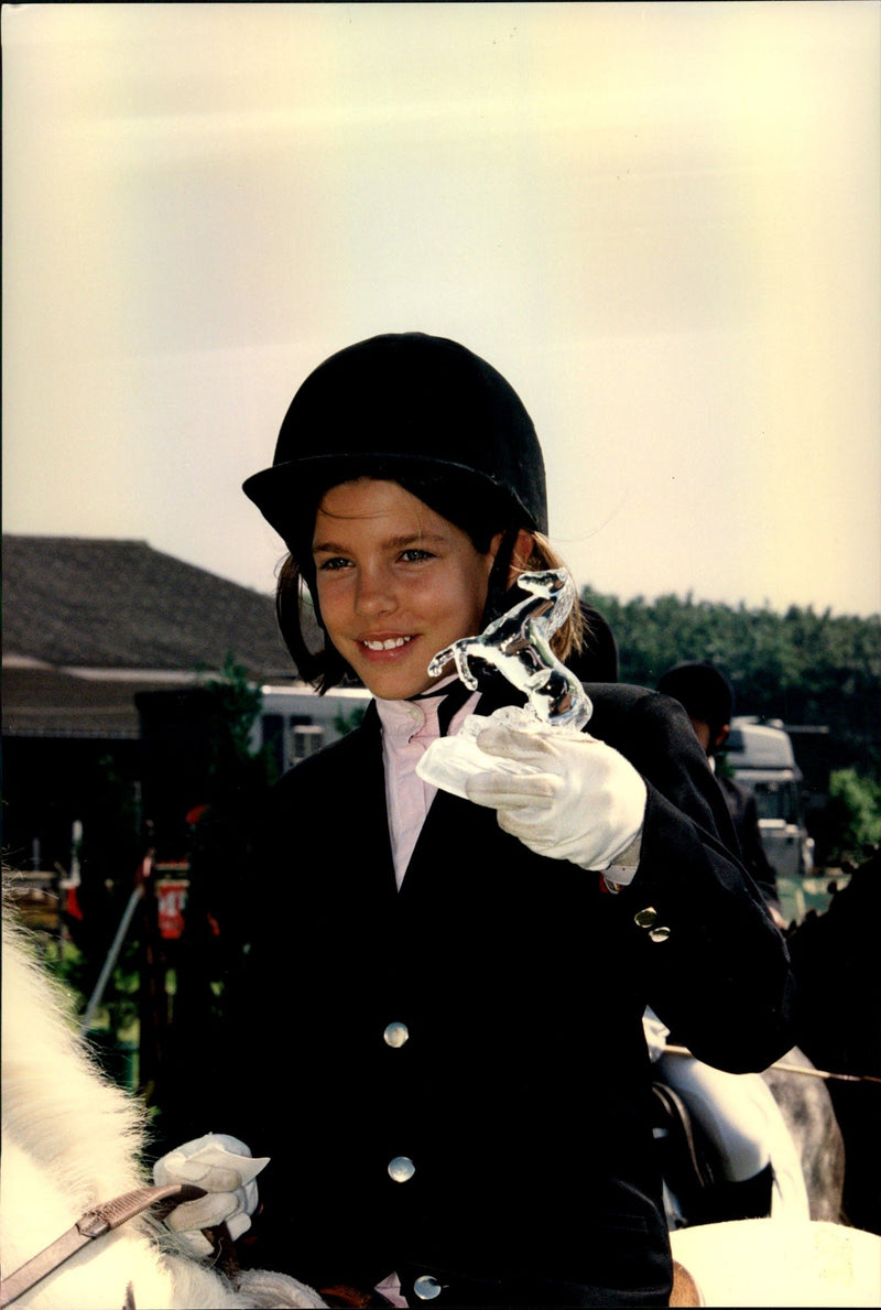 Charlotte Casiraghi shows his prize after a jump competition in Lummen - Vintage Photograph