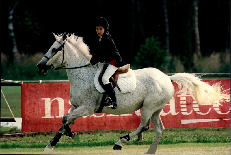 Charlotte Casiraghi at a jump competition in Lummen - Vintage Photograph