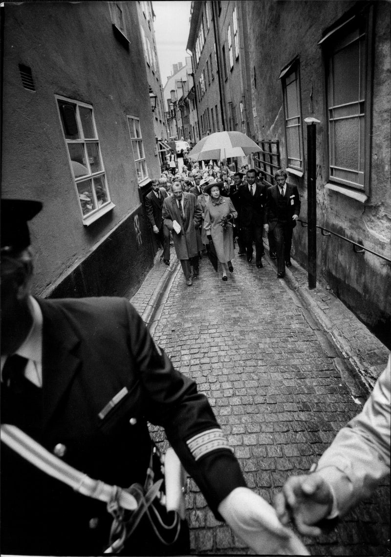 The police clear the way of Queen Elizabeth II during her tour of the Old Town - Vintage Photograph