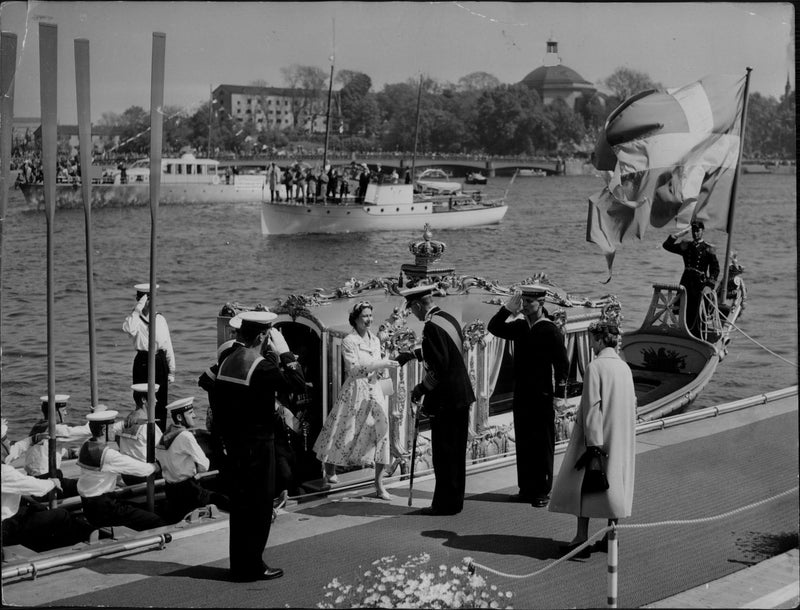 Queen Elizabeth II takes his first step on Swedish soil and is greeted by King Gustaf VI Adolf and Queen Louise Mountbatten on the LogÃ¥rdstrappan - Vintage Photograph