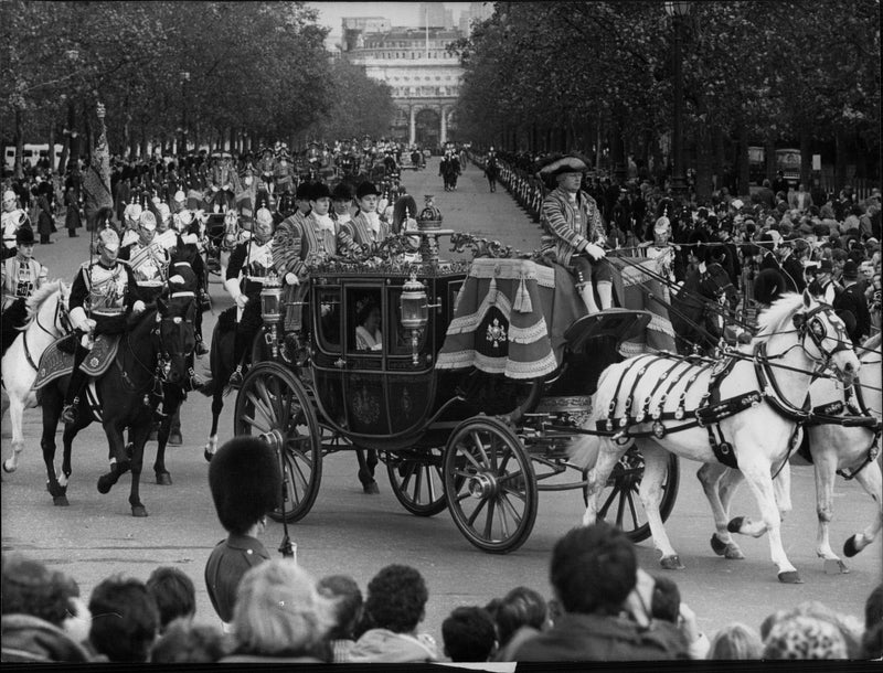 Queen Elizabeth II and Prince Philip arrive briefly at the opening of parliament. - Vintage Photograph