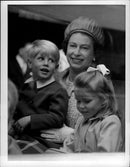 Queen Elizabeth with Prince Edward and Lady Sarah Armstrong-Jones during their vacation in Scotland - Vintage Photograph