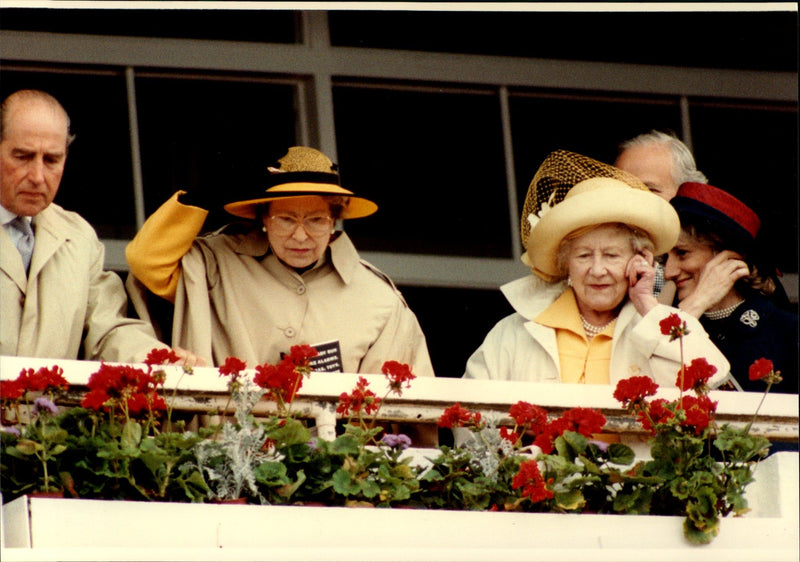 Queen Mother and Queen Elizabeth II are looking at a Derby match - Vintage Photograph