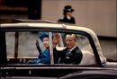 Queen Elizabeth and Prince Philip arrive at the celebration of their 50th wedding anniversary. - Vintage Photograph