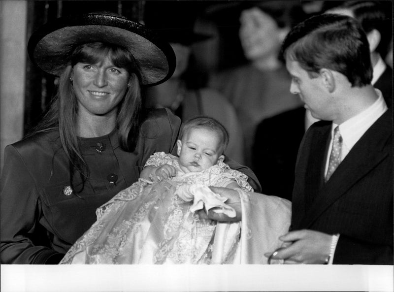 Prince Andrew and Sarah under the baptism of their daughter, Princess Beatrice of York. - Vintage Photograph