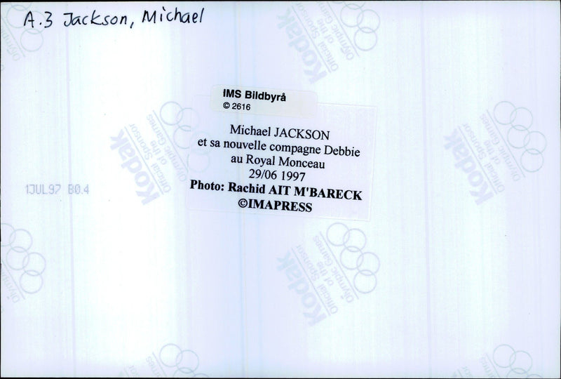 Michael Jackson along with Debbie Rowe on the balcony of their Paris hotel - Vintage Photograph