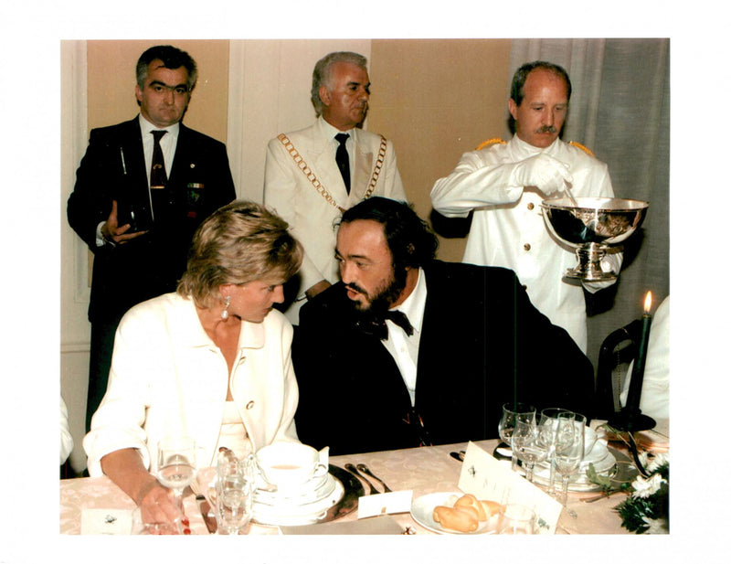 Portrait image of Princess Diana and Luciano Pavarotti taken in an unknown context. - Vintage Photograph