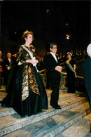 Princess Christina and Japanese writer Kenzaburo Oe, winner of the Nobel Prize in Literature, arrive at dinner. - Vintage Photograph
