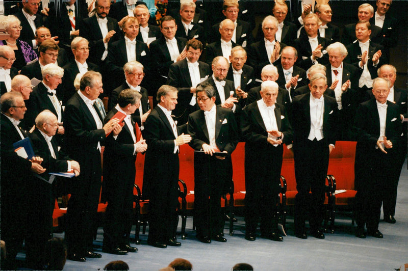 Kenzaburo Oe and the other winners of the Nobel Prize 1994, during the award ceremony in the Concert Hall. - Vintage Photograph
