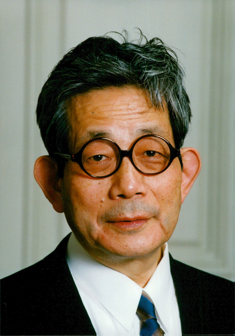 Portrait image of Japanese author Kenzaburo Oe, winner of the Nobel Prize in Literature in 1994. - Vintage Photograph