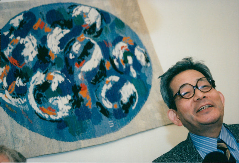 Portrait image of Japanese author Kenzaburo Oe, winner of the Nobel Prize in Literature in 1994. - Vintage Photograph