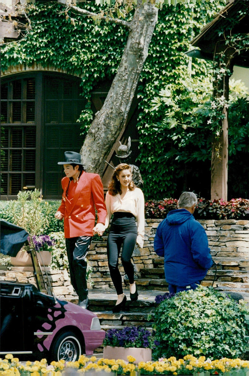 Lisa Marie Presley and Michael Jackson welcome a crowd of children to the Neverland Ranch - Vintage Photograph