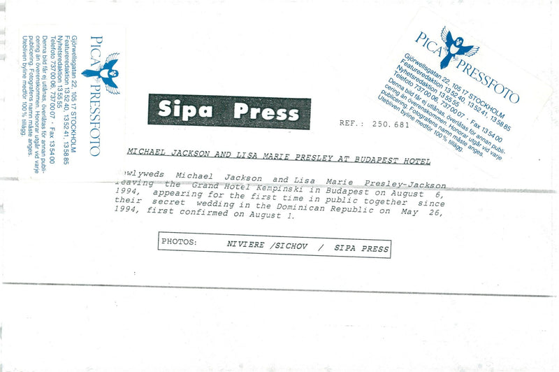 The newlywed couple Lisa Marie Presley and Michael Jackson leave the Grand Hotel Kempinski hotel in Budapest - Vintage Photograph