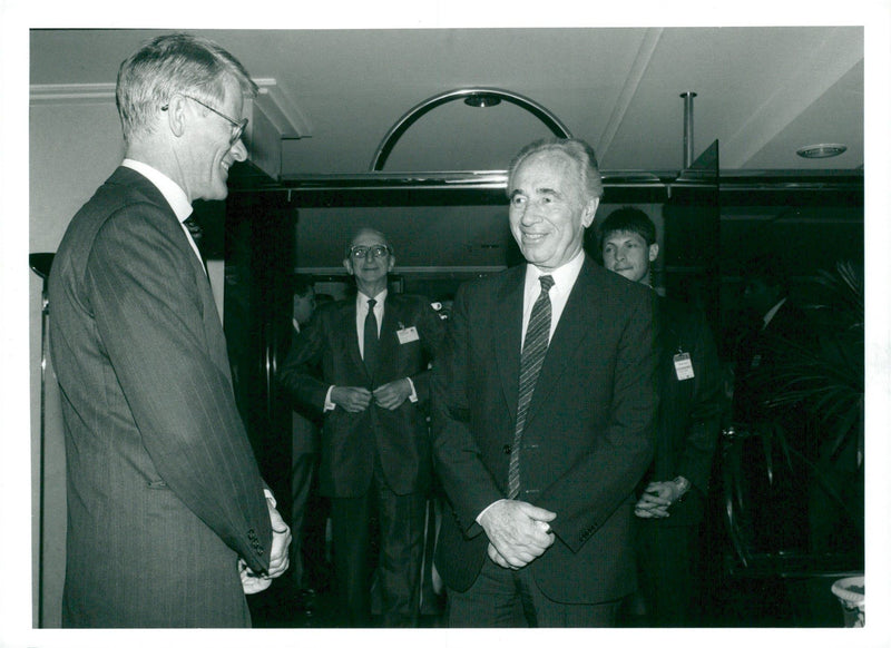 Israeli politician Shimon Pere in conversation with Ingvar Carlsson. - Vintage Photograph