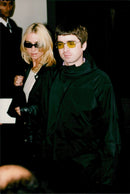 Noel Gallagher along with my wife, Matthews. - Vintage Photograph