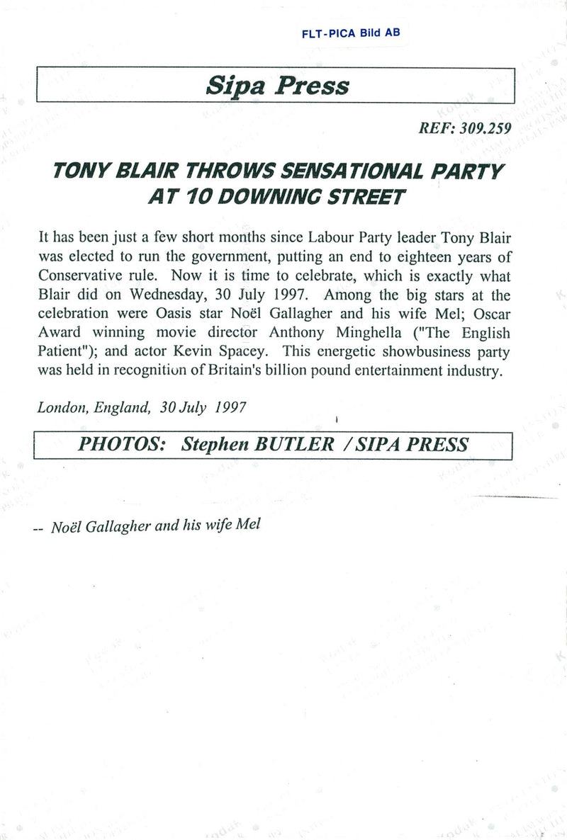 Oasis member Noel Gallagher with his wife Mel on his way to a party. - Vintage Photograph