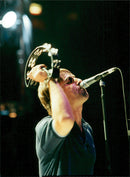 Rock group Oasis member, Liam Gallanger, rock the stage during the group&