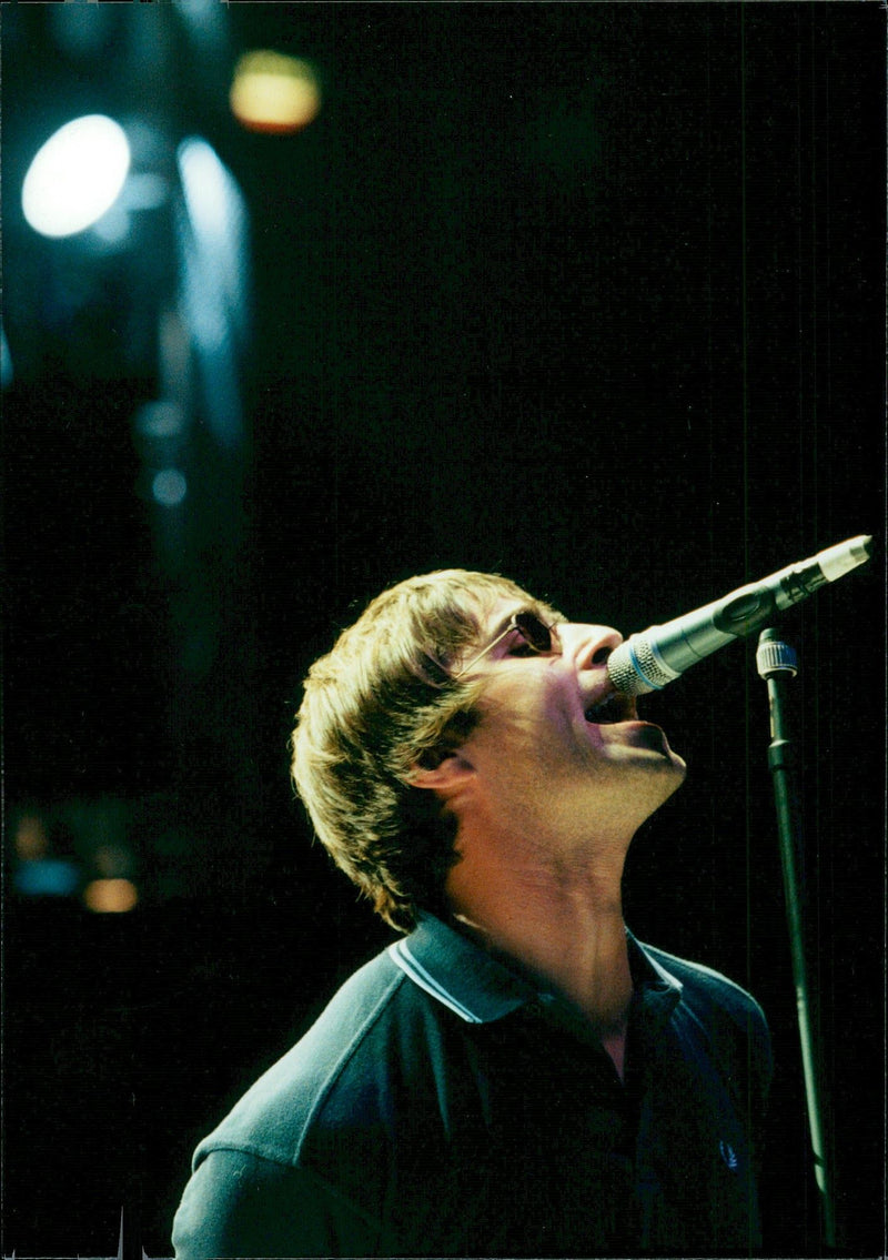 Rock group Oasis member, Liam Gallanger, rock the stage during the group&