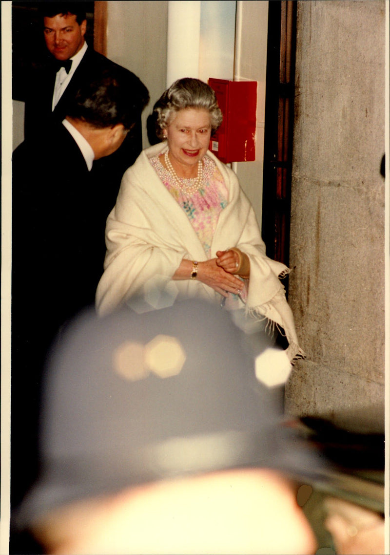 Queen Elizabeth II on his way to a charity event. - Vintage Photograph