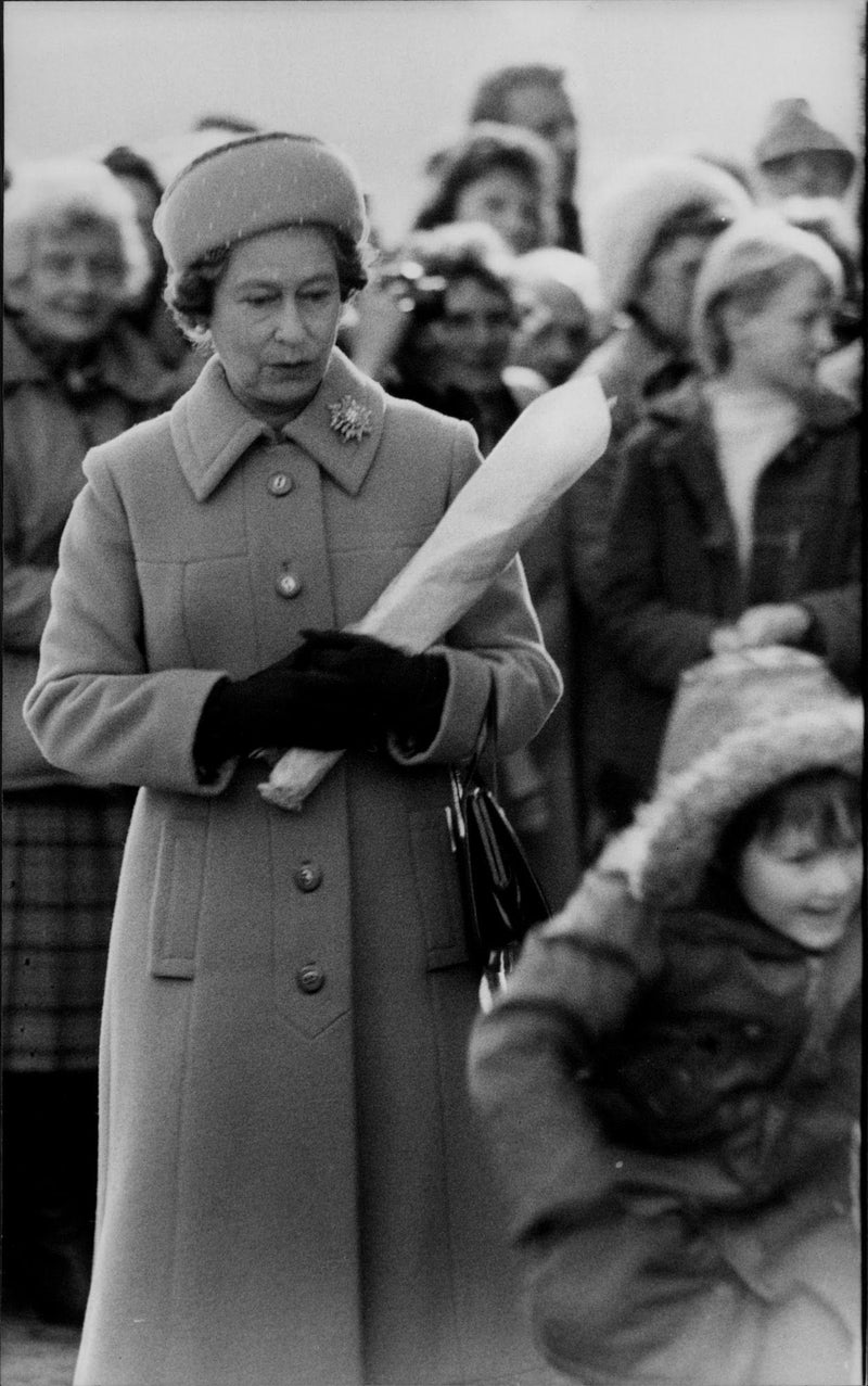 Queen Elizabeth II receives flowers from the six-year Gavin Templeman outside the West Newton Church - Vintage Photograph