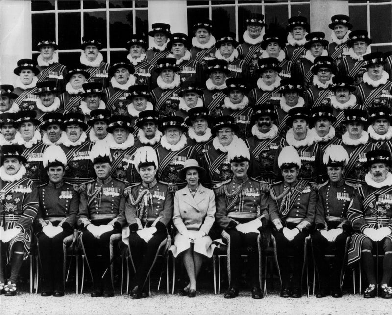 Queen Elizabeth II surrounded by his bodyguards at Buckingham Palace - Vintage Photograph