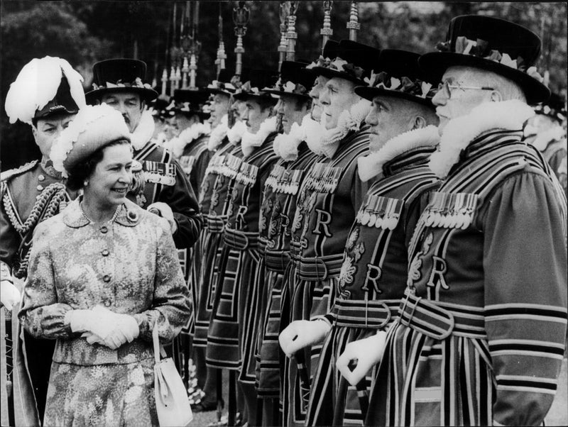 Queen Elizabeth II inspects his choir &quot;Yeomen of the Guard&quot; outside Buckingham Palace - Vintage Photograph