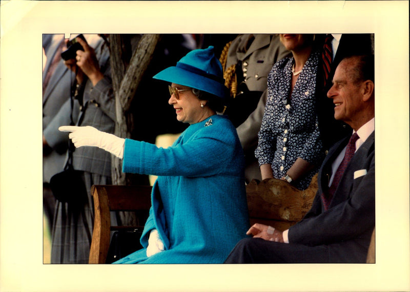 Queen Elizabeth shouts in the audience under Prince Charles Polomatch at Smith Square. - Vintage Photograph