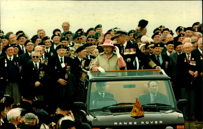 Queen Elizabeth II with Prince Philip looks at paradise with 7000 war veterans - Vintage Photograph