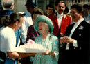 Queen Elizabeth was raised by an admirer on his 95th birthday. - Vintage Photograph