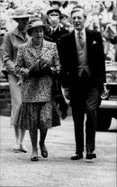 Queen Elizabeth arrives at the church together with Angus Ogilvy - Vintage Photograph