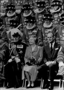 Queen Elizabeth and Prince Philip pose with their Beefeaters - Vintage Photograph