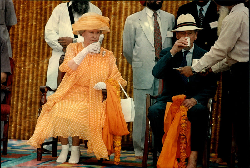 Queen Elizabeth II and Prince Philip visit the &quot;Golden Temple&quot; in the holy city of Amritsar - Vintage Photograph