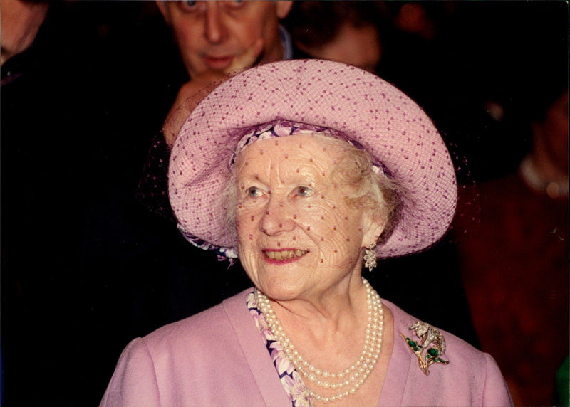 Queen Elizabeth is visiting a flower show. - Vintage Photograph