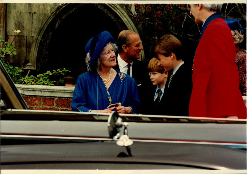 Queen Elizabeth, Prince Philip, Prince Harry and Prince William in an unknown context. - Vintage Photograph