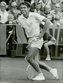 Action image of Manuel Santana taken in an unknown contest. - Vintage Photograph