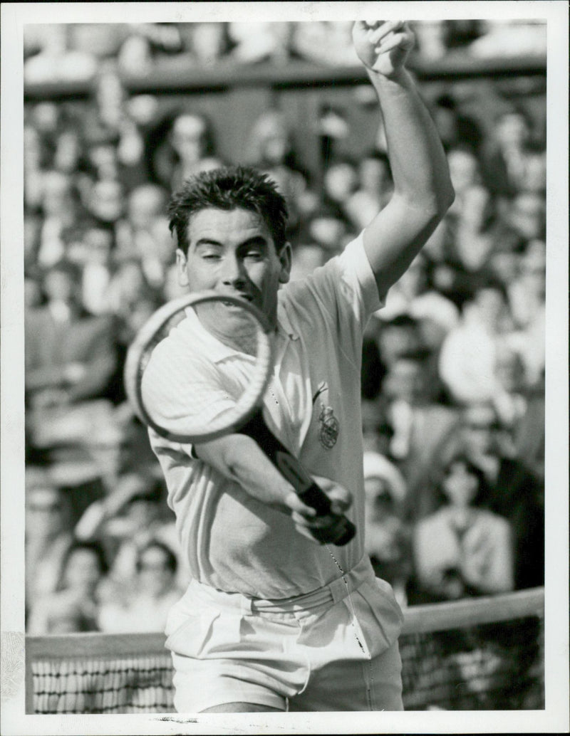 Action image of Manuel Santana taken in an unknown contest. - Vintage Photograph