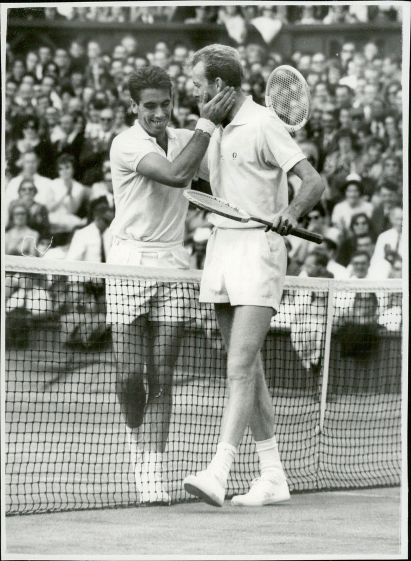 Manuel Santana congratulates the winner, F. Stolle from Australia, to win in the semi-finals of the Wimbledon Open. - Vintage Photograph