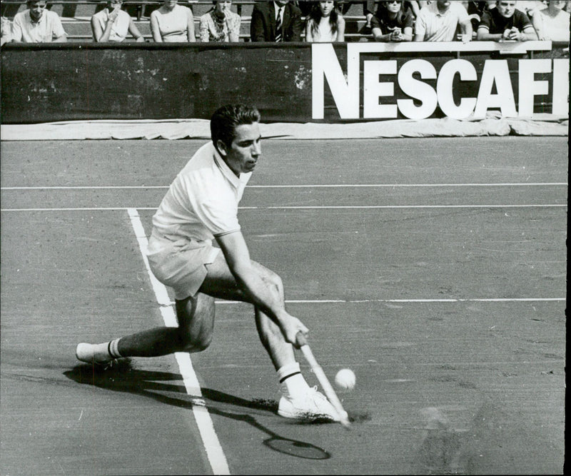 Action image of Manuel Santana taken in an unknown contest. - Vintage Photograph