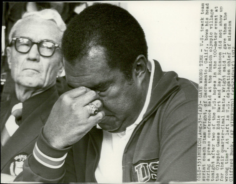 Clifford Buck and American Wright Trainer Stan Wright at a press conference during the 1972 Olympic Games - Vintage Photograph