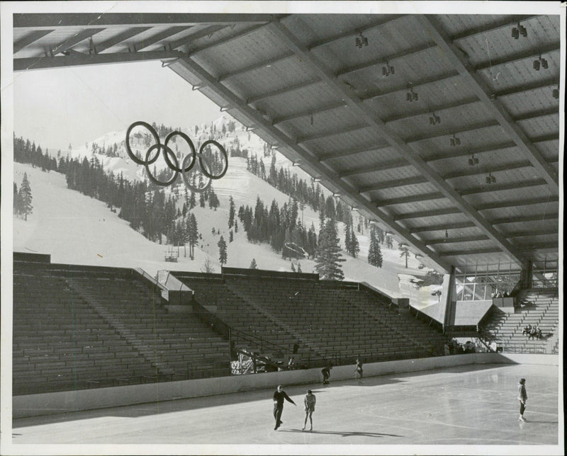 The figure skaters train at the venue where the Olympic competitions will be held - Vintage Photograph