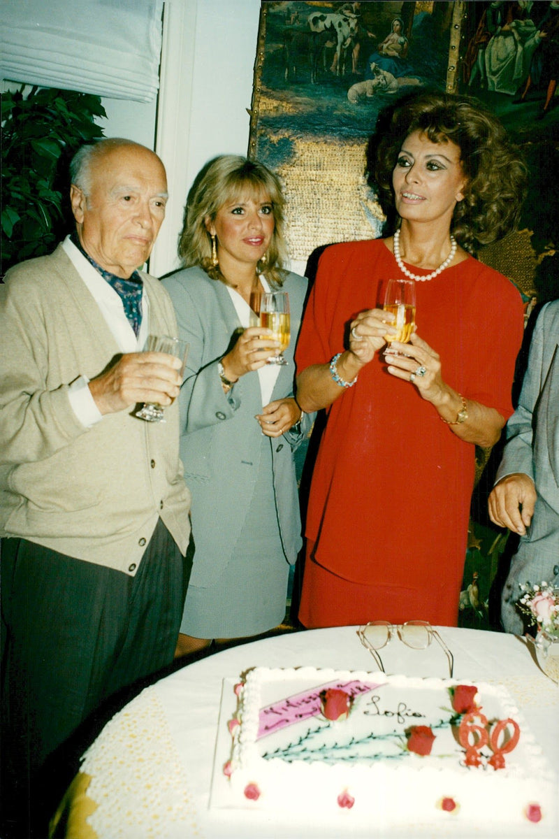Sophia Loren celebrates her 60th birthday together with director Carlo Ponti, her sister Anna Maria with husband Tamiz and niece Alessandra Mussolini - Vintage Photograph