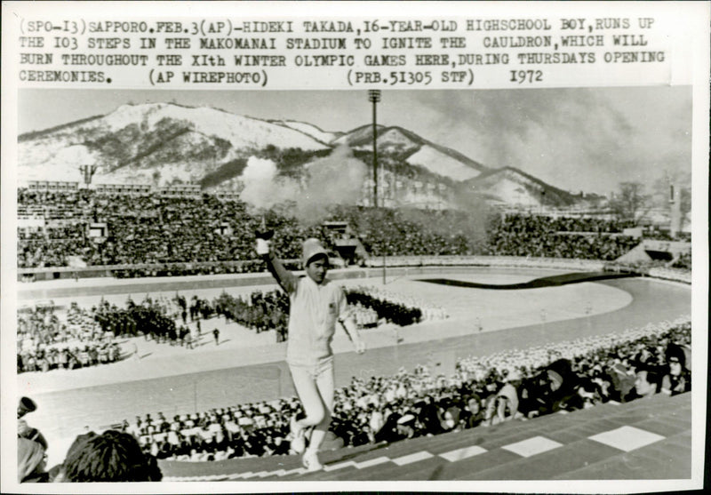 The 16-year-old torch carrier jumped easily up the 103 steps to light the Olympic fire. - Vintage Photograph