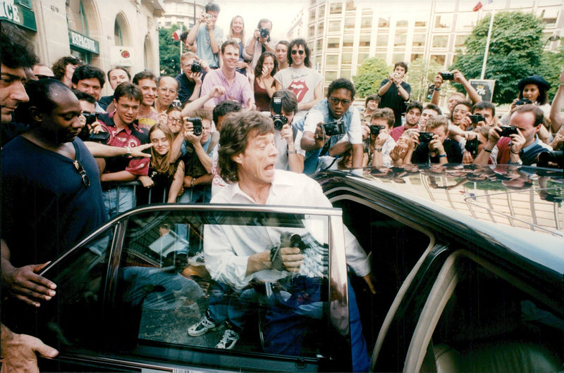 The Rolling Stones are photographed by fans while staying in Paris - Vintage Photograph